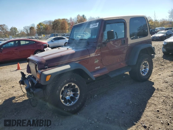 2002 Jeep Wrangler Sahara with VIN 1J4FA59S22P704603, listed as a Copart auction lot 77554334 with 99,758 mi miles and Salvage Title. Bid and sale history available at carsss.com. Image 1.