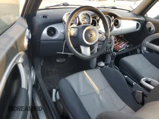 2006 MINI Convertible S with VIN WMWRH33526TL93206, listed as a Copart auction lot 46114075 with 60,526 mi miles and Salvage title. Bid and sale history available at DreamBid. Image 8.