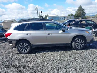 2015 Subaru Outback Limited with VIN 4S4BSAJC9F3218703, listed as a IAAI auction lot 41924281 with 90,233 mi miles and . Bid and sale history available at DreamBid. Image 14.