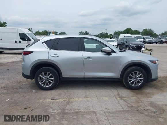 2023 Mazda CX-5 S Carbon Edition z VIN JM3KFBCM3P0197796, wystawiony jako IAAI lot #42408301 z przebiegiem 46 169 mil mil oraz . Historia ofert i sprzedaży dostępna na DreamBid. Obrazek 13.
