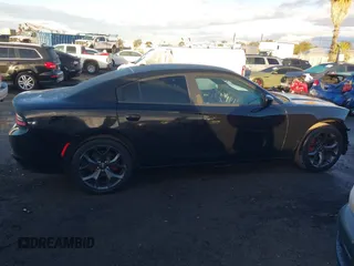 2020 Dodge Charger SXT z VIN 2C3CDXBG0LH123712, wystawiony jako IAAI lot #41432187 z przebiegiem 83 946 mil mil oraz . Historia ofert i sprzedaży dostępna na DreamBid. Obrazek 14.