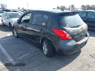 2012 Nissan Versa S with VIN 3N1BC1CP4CK203309, listed as a IAAI auction lot 41614884 with 141,770 mi miles. Bid and sale history available at carsss.com. Image 3.