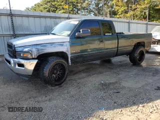 1999 Dodge Ram 2500 with VIN 1B7KC2368XJ548487, listed as a Copart auction lot 77256244 with 301,818 mi miles and Salvage Title. Bid and sale history available at carsss.com. Image 1.