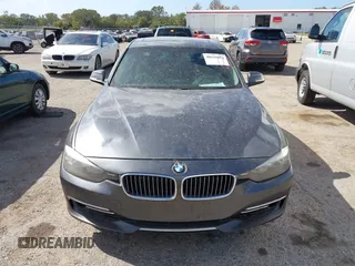 2013 BMW 3 Series 328i xDrive with VIN WBA3B3G56DNR81144, listed as a IAAI auction lot 40620694 with 159,022 mi miles. Bid and sale history available at carsss.com. Image 12.