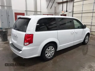 2018 Dodge Grand Caravan SE with VIN 2C4RDGBG5JR190786, listed as a IAAI auction lot 41603163 with 102,351 mi miles and . Bid and sale history available at DreamBid. Image 4.