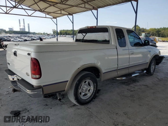1998 Ford F-150 XL with VIN 1FTRX17L8WNA36541, listed as a Copart auction lot 70861344 with 266,137 mi miles and Salvage title. Bid and sale history available at DreamBid. Image 3.