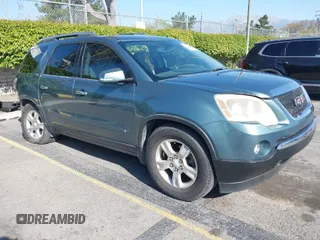 2009 GMC Acadia SLT1 with VIN 1GKER23D79J139611, listed as a IAAI auction lot 41969438 with 133,596 mi miles. Bid and sale history available at carsss.com. Image 1.