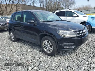 2013 Volkswagen Tiguan SEL with VIN WVGBV3AX1DW581790, listed as a Copart auction lot 51319665 with 194,237 mi miles and Clean Title. Bid and sale history available at DreamBid. Image 4.