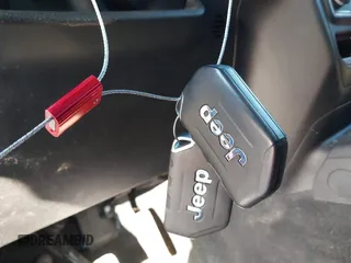 2021 Jeep Wrangler Unlimited Sport S with VIN 1C4HJXDN4MW779291, listed as a IAAI auction lot 41290109 with 43,379 mi miles and . Bid and sale history available at DreamBid. Image 11.