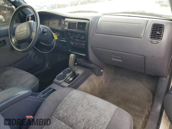 1999 Toyota Tacoma PreRunner with VIN 4TASM92NXXZ476400, listed as a Copart auction lot 81001204 with 280,797 mi miles and Salvage title. Bid and sale history available at DreamBid. Image 8.