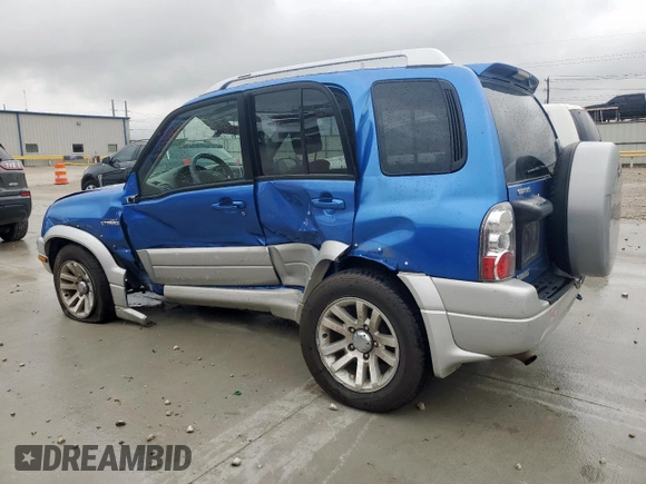 2005 Suzuki Grand Vitara LX with VIN JS3TD62V354200952, listed as a Copart auction lot 60374465 with 134,957 mi miles and Salvage title. Bid and sale history available at DreamBid. Image 2.