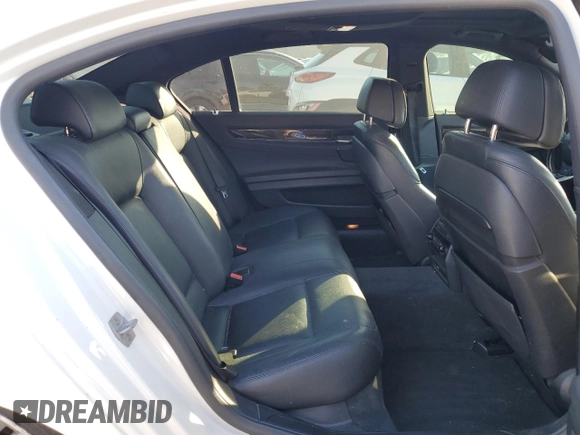 2015 BMW 7 Series 740Li with VIN WBAYE4C51FD947047, listed as a Copart auction lot 86773284 with 90,714 mi miles and Salvage Title. Bid and sale history available at DreamBid. Image 10.