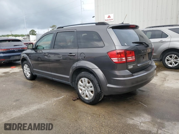 2016 Dodge Journey American Value with VIN 3C4PDCAB8GT138354, listed as a Copart auction lot 52383675 with 142,174 mi miles and Salvage Title. Bid and sale history available at DreamBid. Image 2.
