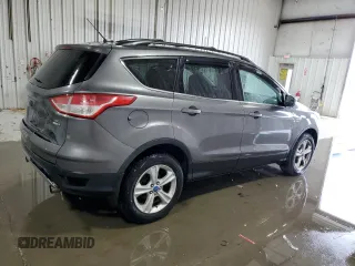 2013 Ford Escape SE with VIN 1FMCU9G98DUC73305, listed as a Copart auction lot 54542445 with 178,945 mi miles and Salvage Title. Bid and sale history available at DreamBid. Image 3.
