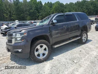 2015 Chevrolet Suburban LTZ with VIN 1GNSKKKC3FR158172, listed as a Copart auction lot 62030195 with 202,755 mi miles and Salvage title. Bid and sale history available at DreamBid. Image 1.