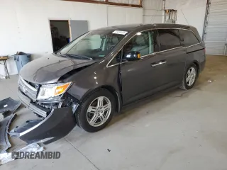 2011 Honda Odyssey Touring с VIN 5FNRL5H96BB039730, выставлен на аукционе Copart как лот 53034305 с пробегом 98 043 миль миль и Списание • Salvage title. История ставок и продаж доступна на DreamBid. Изображение 1.