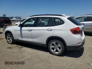 2014 BMW X1 sDrive28i z VIN WBAVM1C51EVW51832, wystawiony jako Copart lot #60153925 z przebiegiem 101 781 mil mil oraz Szkoda całkowita • Salvage title. Historia ofert i sprzedaży dostępna na DreamBid. Obrazek 2.
