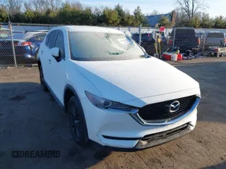 2017 Mazda CX-5 Touring with VIN JM3KFBCL8H0136601, listed as a IAAI auction lot 41830355 with 113,677 mi miles. Bid and sale history available at carsss.com. Image 1.