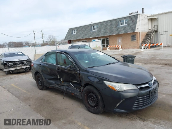 2015 Toyota Camry LE with VIN 4T1BD1FK6FU157623, listed as a IAAI auction lot 42015005 with 300,974 mi miles and . Bid and sale history available at DreamBid. Image 1.
