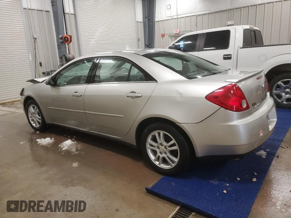 2006 Pontiac G6 6-Cyl z VIN 1G2ZG558764174412, wystawiony jako Copart lot #45677485 z przebiegiem 286 524 mil mil oraz Czysty tytuł • Clean title. Historia ofert i sprzedaży dostępna na DreamBid. Obrazek 2.