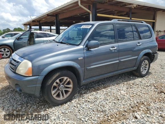 2005 Suzuki XL7 LX z VIN JS3TY92VX54102488, wystawiony jako Copart lot #56700595 z przebiegiem 169 827 mil mil oraz Szkoda całkowita • Salvage title. Historia ofert i sprzedaży dostępna na DreamBid. Obrazek 1.
