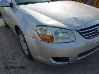 2009 Kia Spectra EX z VIN KNAFE221295658087, wystawiony jako IAAI lot #42409207 z przebiegiem 180 911 mil mil oraz . Historia ofert i sprzedaży dostępna na DreamBid. Obrazek 6.