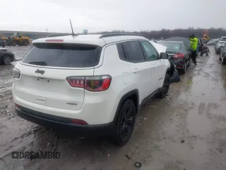 2019 Jeep Compass Latitude with VIN 3C4NJCBB4KT778018, listed as a IAAI auction lot 41900231 with 102,651 mi miles and . Bid and sale history available at carsss.com. Image 4.