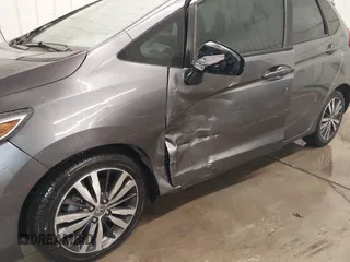 2015 Honda Fit EX-L with VIN 3HGGK5H85FM755006, listed as a IAAI auction lot 41034606 with 97,294 mi miles and . Bid and sale history available at DreamBid. Image 6.