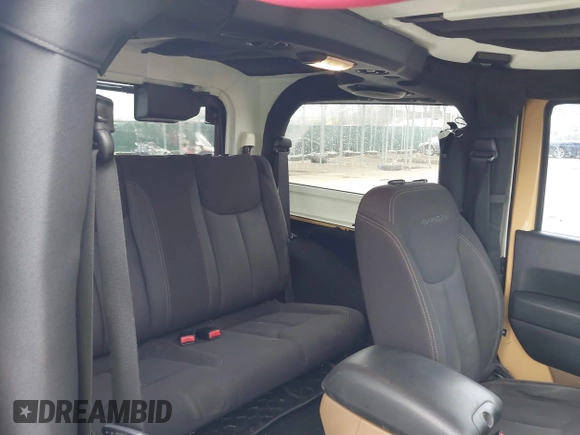 2013 Jeep Wrangler Rubicon 10th Anniversary with VIN 1C4BJWCG5DL688504, listed as a IAAI auction lot 41797184 with 109,414 mi miles and . Bid and sale history available at DreamBid. Image 8.