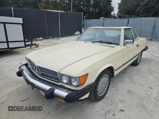 1987 Mercedes-Benz 560 with VIN WDBBA48D5HA061899, listed as a Copart auction lot 76554184 with 68,292 mi miles and Salvage Title. Bid and sale history available at carsss.com. Image 2.