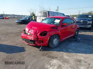 2013 Volkswagen Beetle Fender Edition z VIN 3VWJP7AT8DM674981, wystawiony jako IAAI lot #41685176 z przebiegiem 65 283 mil mil oraz . Historia ofert i sprzedaży dostępna na DreamBid. Obrazek 18.