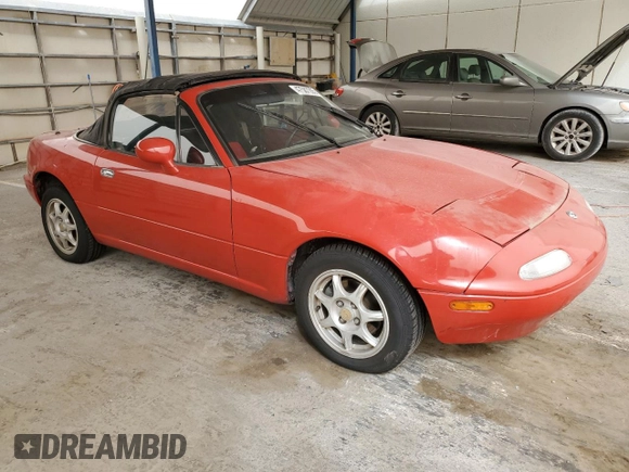 1994 Mazda MX-5 Miata with VIN JM1NA353XR0506259, listed as a Copart auction lot 47587295 with 209,443 mi miles and Salvage title. Bid and sale history available at DreamBid. Image 4.