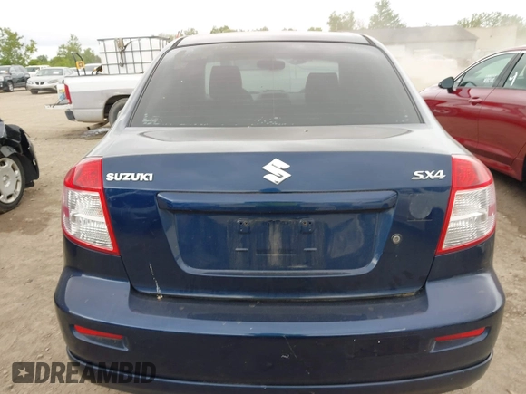 2009 Suzuki SX4 Sport FWD z VIN JS2YC414196200260, wystawiony jako IAAI lot #42354835 z przebiegiem 175 909 mil mil oraz . Historia ofert i sprzedaży dostępna na DreamBid. Obrazek 16.