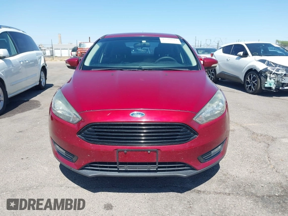 2017 Ford Focus SE with VIN 1FADP3FE3HL206074, listed as a IAAI auction lot 42594911 with 143,814 mi miles and . Bid and sale history available at DreamBid. Image 12.