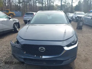 2023 Mazda CX-30 S Carbon Edition with VIN 3MVDMBCM8PM502891, listed as a IAAI auction lot 42050533 with 20,035 mi miles and . Bid and sale history available at DreamBid. Image 12.