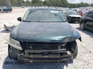 2018 Volkswagen Tiguan S with VIN 3VV0B7AX4JM042248, listed as a Copart auction lot 65202625 with 102,021 mi miles and Salvage title. Bid and sale history available at DreamBid. Image 5.