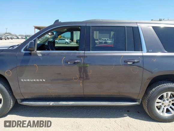 2016 Chevrolet Suburban LT z VIN 1GNSCHKC3GR313126, wystawiony jako IAAI lot #41743640 z przebiegiem 178 351 mil mil oraz . Historia ofert i sprzedaży dostępna na DreamBid. Obrazek 15.