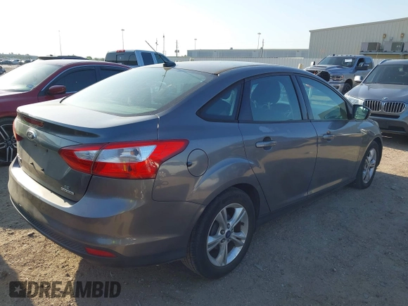 2013 Ford Focus SE with VIN 1FADP3F20DL325958, listed as a IAAI auction lot 41997500 with 195,793 mi miles. Bid and sale history available at carsss.com. Image 4.