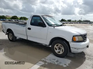 2000 Ford F-150 XL with VIN 1FTRF17W7YNA32092, listed as a Copart auction lot 61569914 with Not provided miles and Clean title. Bid and sale history available at DreamBid. Image 4.