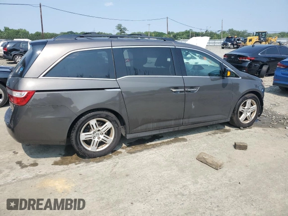 2013 Honda Odyssey Touring with VIN 5FNRL5H93DB017932, listed as a Copart auction lot 60112165 with 110,761 mi miles and Salvage title. Bid and sale history available at DreamBid. Image 3.