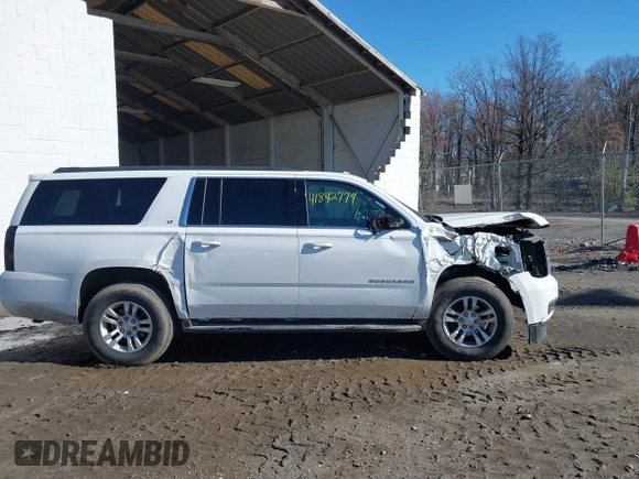 2016 Chevrolet Suburban LT with VIN 1GNSKHKCXGR206948, listed as a IAAI auction lot 41842774 with 190,935 mi miles. Bid and sale history available at carsss.com. Image 14.