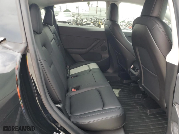 2020 Tesla Model Y Long Range with VIN 5YJYGDEE9LF020148, listed as a Copart auction lot 52031145 with 26,656 mi miles and Salvage Title. Bid and sale history available at carsss.com. Image 11.