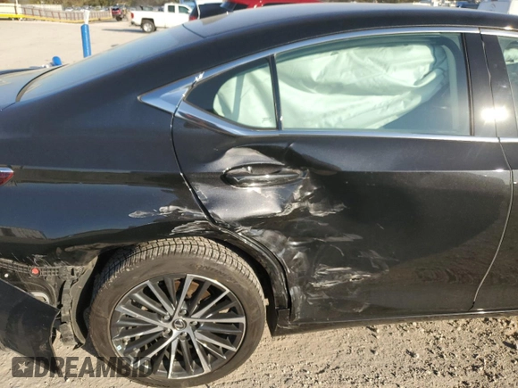 2022 Lexus ES 250 with VIN 58AD11D12NU009293, listed as a Copart auction lot 79694514 with 52,907 mi miles and Salvage title. Bid and sale history available at DreamBid. Image 11.