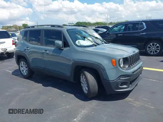 2018 Jeep Renegade Latitude z VIN ZACCJABB8JPG84449, wystawiony jako IAAI lot #42259362 z przebiegiem 62 494 mil mil oraz . Historia ofert i sprzedaży dostępna na DreamBid. Obrazek 1.