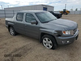 2009 Honda Ridgeline RTL z VIN 5FPYK16569B103645, wystawiony jako Copart lot #58300625 z przebiegiem 103 195 mil mil oraz Szkoda całkowita • Salvage title. Historia ofert i sprzedaży dostępna na DreamBid. Obrazek 4.