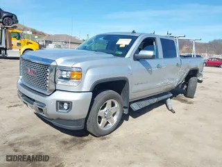 2015 GMC Sierra 2500HD Denali with VIN 1GT120EG3FF135791, listed as a IAAI auction lot 41854102 with 93,186 mi miles. Bid and sale history available at carsss.com. Image 2.