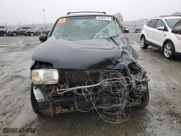 2003 Ford Escape XLS Popular with VIN 1FMYU021X3KA70123, listed as a Copart auction lot 86005514 with 0 mi miles and Salvage Title. Bid and sale history available at carsss.com. Image 5.