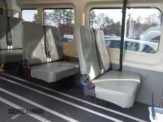 2023 Ford Transit Cargo with VIN 1FTBR1C86PKA52494, listed as a IAAI auction lot 40740671 with 9,999 mi miles and . Bid and sale history available at DreamBid. Image 8.