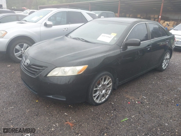 2007 Toyota Camry CE with VIN JTNBE46K573000686, listed as a IAAI auction lot 41971943 with 302,136 mi miles. Bid and sale history available at carsss.com. Image 2.