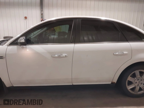 2008 Ford Taurus Limited with VIN 1FAHP25W28G173633, listed as a IAAI auction lot 40994885 with 133,974 mi miles. Bid and sale history available at carsss.com. Image 14.